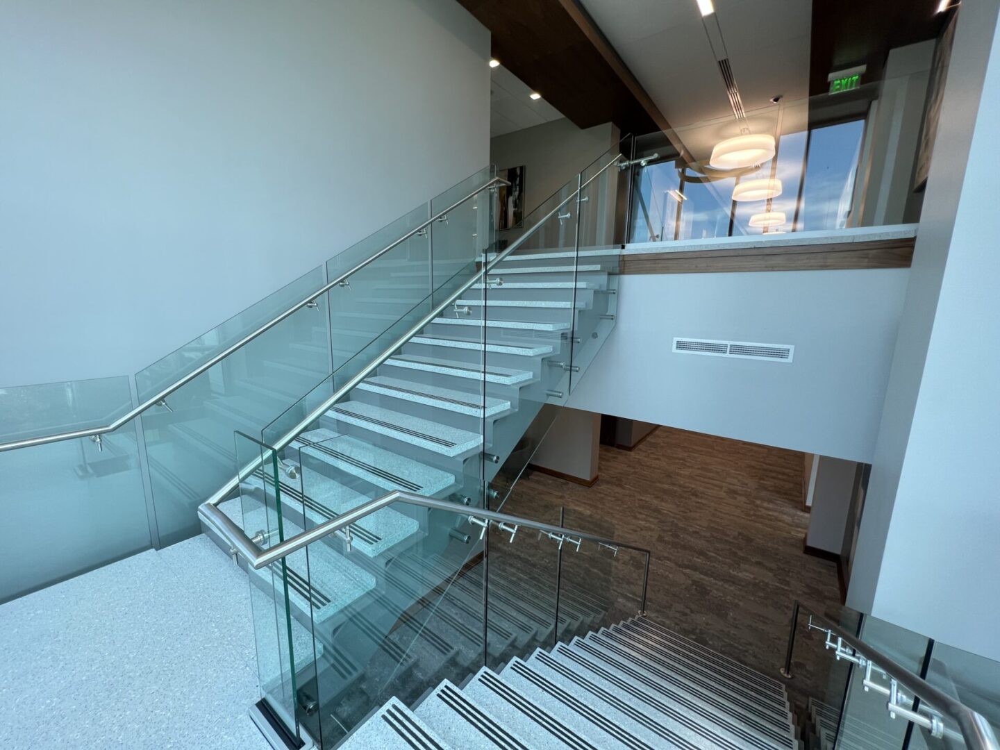 A Glass Railing for a White STairrs