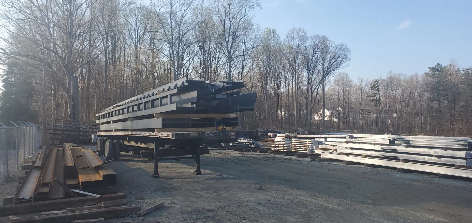 A truck transporting steel beams
